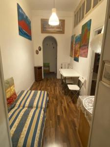 A bed or beds in a room at Central Apartment in Trastevere