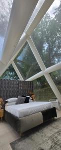 Posteľ alebo postele v izbe v ubytovaní Bubble Glamping Sicily