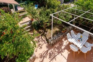 an overhead view of a patio with a table and chairs at Holiday Home Mareta in Dubrovnik
