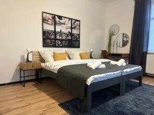 Postel nebo postele na pokoji v ubytování Apartments 23