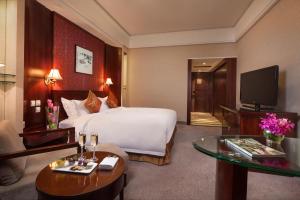 TV a/nebo společenská místnost v ubytování Overseas Chinese Hotel Wenzhou