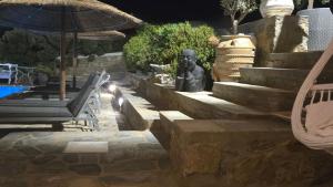 Bazén v ubytování Manu Mykonos Next to the Beach Quality Brand Villa & Bungalows nebo v jeho okolí