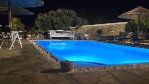 Bazén v ubytování Manu Mykonos Next to the Beach Quality Brand Villa & Bungalows nebo v jeho okolí