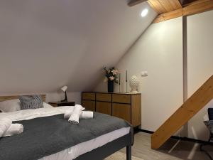 Postel nebo postele na pokoji v ubytování Apartments 23