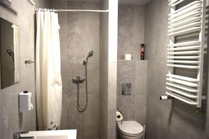 Koupelna v ubytování Cozy Rooms Apartment Białystok + 11 fotografií