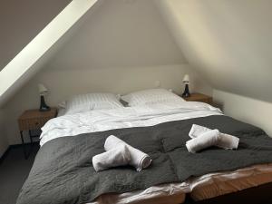 Postel nebo postele na pokoji v ubytování Apartments 23