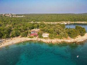 an aerial view of an island in the water at Apartment & Room Danijel in Pinezici