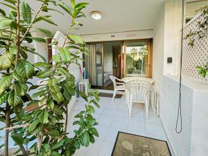 Et opholdsområde på Ange Gardien - AC, Parking, Piscine