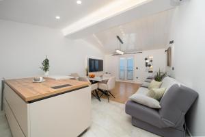 Kuchyň nebo kuchyňský kout v ubytování Apartmani Miranda