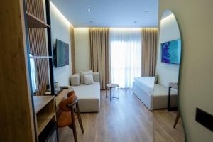 TV a/nebo společenská místnost v ubytování Rumar Hotel