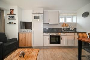Köök või kööginurk majutusasutuses Residence Alpin Kaprun incl SUMMER CARD by All in One Apartments