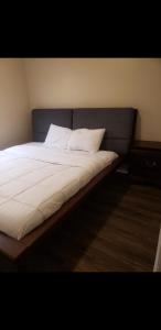 Ένα ή περισσότερα κρεβάτια σε δωμάτιο στο Beautiful 3 Bed Vacation home