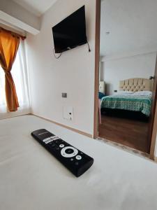 Postel nebo postele na pokoji v ubytování La Posada Mia + 2 fotografie