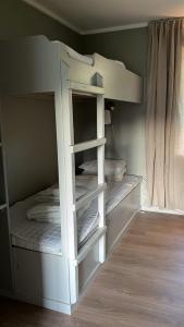 a white bunk bed in a room at Olletorp in Munkedal +14 photos