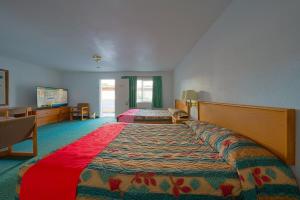 Postel nebo postele na pokoji v ubytování Budget 8 Motel