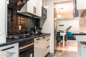 Η κουζίνα ή μικρή κουζίνα στο The 1A Modern apartment
