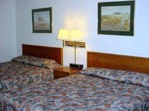 Postel nebo postele na pokoji v ubytování Budget 8 Motel
