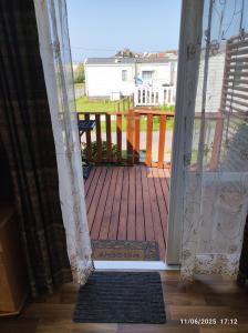 Balcone o terrazza di CHEZ ISA - Mobil home 2 ch - vue direct sur mer