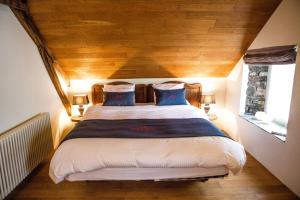 Postel nebo postele na pokoji v ubytování B&B Le Tapis Rouge