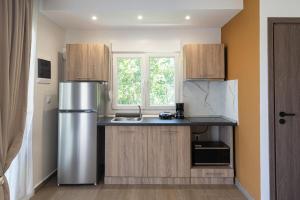 Kuchyň nebo kuchyňský kout v ubytování Twin Escape Sea & Corfu town