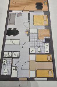 eine Zeichnung eines Stockwerks eines Gebäudes in der Unterkunft Luhtitalon alakerran huoneisto superior apartments vuokralle viikoksi 29 in Vierumäki