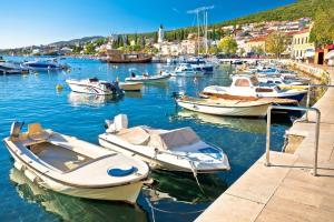 a bunch of boats are docked in a harbor at Noa Selce Retreat House in Selce