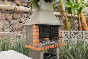 a bird house sitting on top of a table at Villa Bio Finca With Pool in Playa Paraiso