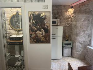 Kuchyň nebo kuchyňský kout v ubytování B&B Apartments Coli Apartman Dora Self check in
