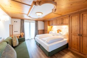 Ένα ή περισσότερα κρεβάτια σε δωμάτιο στο Residence Bosco Verde