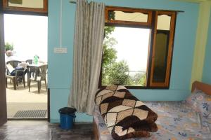 Posezení v ubytování Fikkalay Harmony Homestay
