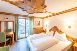 Ένα ή περισσότερα κρεβάτια σε δωμάτιο στο Residence Bosco Verde +86 φωτογραφίες