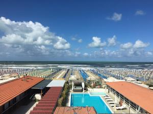 a view of the ocean from the balcony of a resort at Casa OliVera in Viareggio