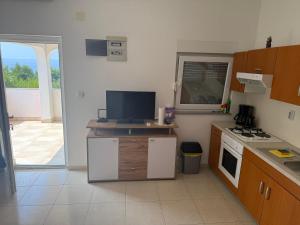 Kuchyň nebo kuchyňský kout v ubytování Apartman Kraljević Vir