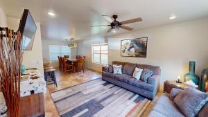 a living room with a couch and a table at Wildhorse Canyon #14A3 in Moab