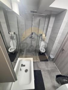 Koupelna v ubytování Poco Beach Studio + 6 fotografií