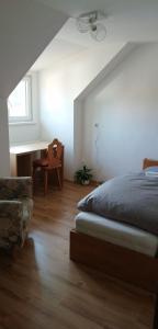 Postel nebo postele na pokoji v ubytování Apartmán Linden