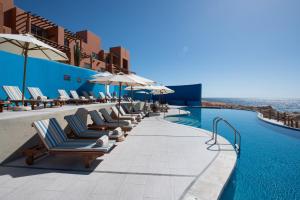 Bazén v ubytování Club Regina Los Cabos nebo v jeho okolí
