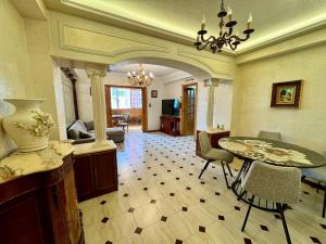 a large living room with a table and chairs at Wagner Playa Apartment in Cullera