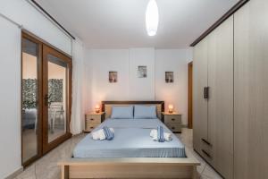 Postel nebo postele na pokoji v ubytování Beachfront Apartments Durres