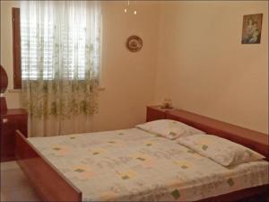 Postel nebo postele na pokoji v ubytování Holiday Home Kata - Two-Bedroom Holiday Home with Balcony