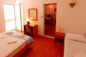 Postel nebo postele na pokoji v ubytování Guest House Zec - Apartment A2 2