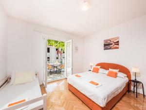 Ένα ή περισσότερα κρεβάτια σε δωμάτιο στο Apartment Hope ST - Two Bedroom Apartment with Balcony