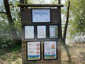 a sign for a park with interpretive signs on it at 4 person holiday home in ESLÖV in Eslöv