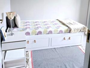 a bedroom with a bed and a nightstand at 4 star holiday home in Ljusne in Ljusne