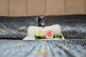 AM Apparts Suite Jacuzzi客房内的一张或多张床位