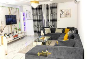 AM Apparts Suite Jacuzzi的休息区