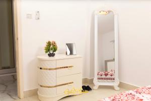 AM Apparts Suite Jacuzzi客房内的一张或多张床位
