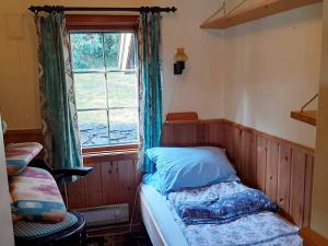 Postel nebo postele na pokoji v ubytování 6 person holiday home in Lyngdal