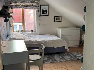 Postel nebo postele na pokoji v ubytování 8 person holiday home in LARVIG