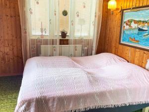 Postel nebo postele na pokoji v ubytování 4 star holiday home in ÅSTOL